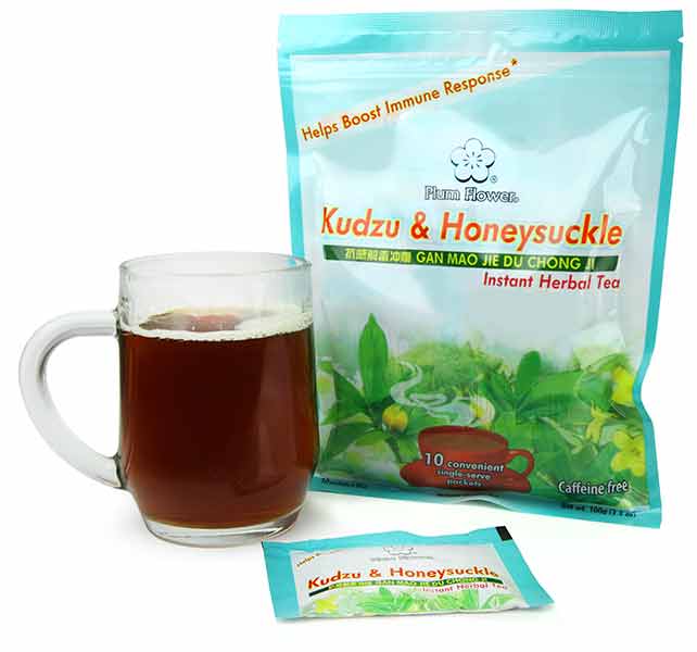 Plum Flower™ Kudzu & Honeysuckle Instant Herbal Tea, with clear glass mug filled with tea
